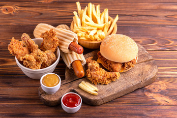 Delicious but unhealthy food with ketchup and mustard