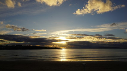 sea with blue sky and clouds