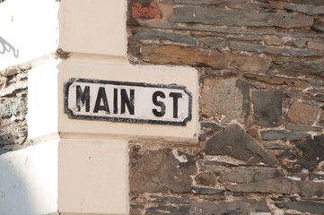 vintage main street sign on stone building