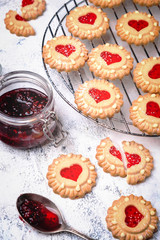 Obraz na płótnie Canvas homemade heart shaped jam cookies for valentine's day