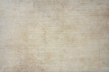 Rugged wrinkled beige brown paper background