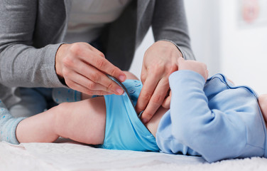 Replacing a dirty diaper with a clean one