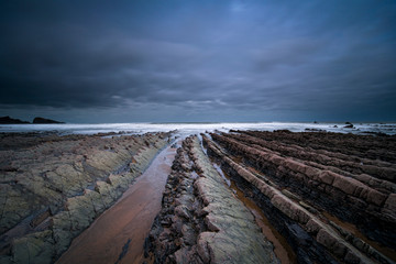 Jagged rocks on the north devon coastline at welcombe mouth beach