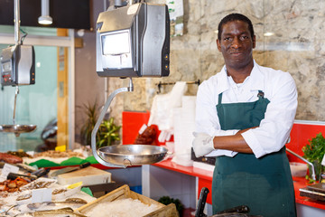 Salesman portrait in fish shop