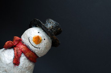 Snowman on black background - obrazy, fototapety, plakaty