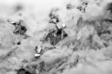 Crystals Rhodochrosite with particles of Pyrite. Black-and white  texture of mineral for background.  Macro
