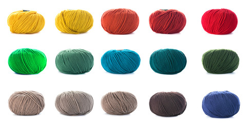 collection of wool knitting on white background