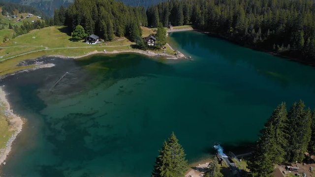 Arni lake (Arnisee) surrounded by Swiss Alps. Arni lake is a reservoir in the Canton of Uri, Switzerland.