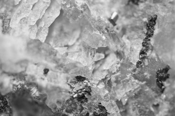 Crystals Rhodochrosite with particles of Pyrite. Black-and white  texture of mineral for background.  Macro