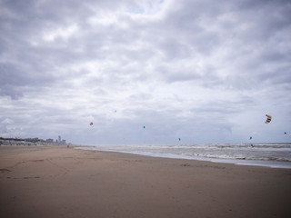 stormy beach day with clouds and kitesurfing at bloomingdale beach