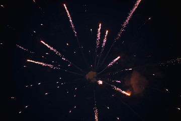 Fireworks. Stars and shiny fireworks on red background.