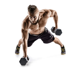 Handsome man doing  exercise with dumbbells. Photo of muscular man isolated on white background. Strength and motivation.