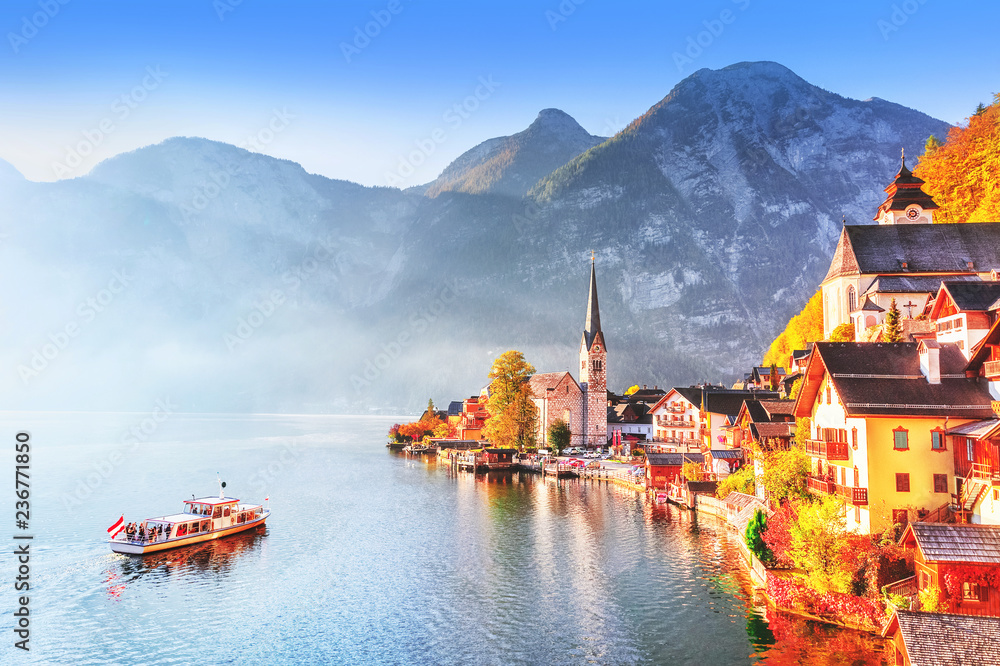 Wall mural hallstatt village on hallstatter see lake in high alps mountains. picturesque landscape of great alp