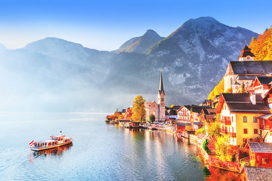 Hallstatt village on Hallstatter See Lake in High Alps Mountains. Picturesque landscape of Great Alpine nature. Hallstatt is famous romantic European UNESCO travel destination.