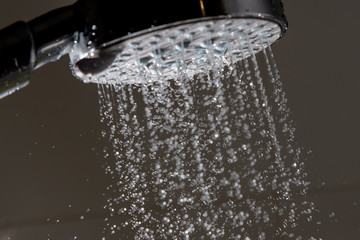 Obraz na płótnie Canvas Shower head and water drops.