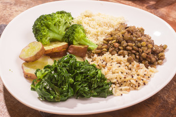 Brazilian Vegan Meal (lentil, rice, sweet potato, broccoli, brazilian cabbage and manioc flour)