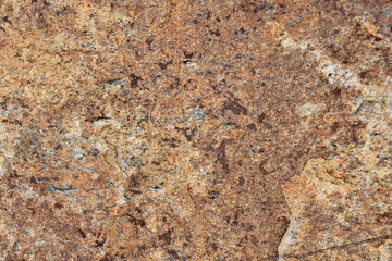 Brown stone texture with marble coating.