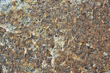 Brown stone texture with marble coating.