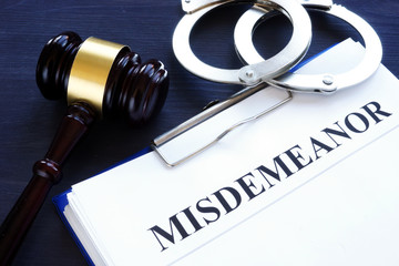 Documents with title misdemeanor and gavel.