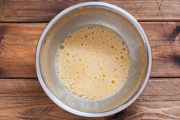Step-by-step cooking of buckwheat krupenik with cottage cheese, step 2 - mixing ingredients, selective focus, top view