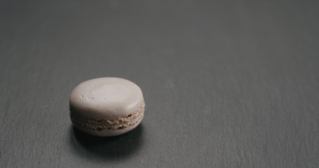 beige macaron on slate board