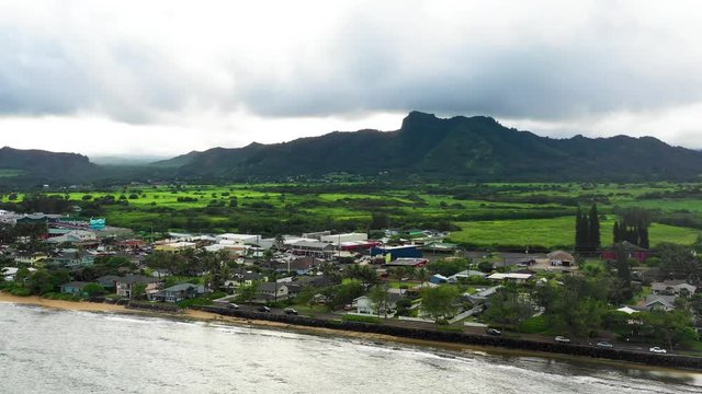 Aerial View of Kapaa Eastern Kauai Hawaii Shore Rising Up
