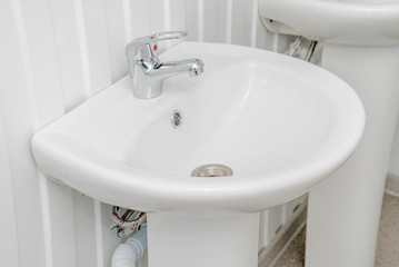 The photo of a sink in a bathroom