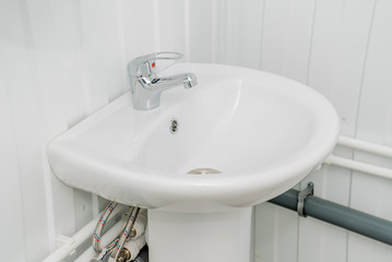 The photo of a sink in a bathroom