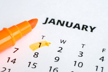 The concept of the new year. The first of January is marked on the calendar 2019 with an orange...