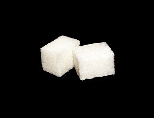sugar isolated on black background