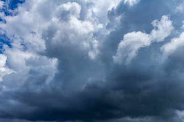 A densely cloudy sky with storm clouds. Resource for designers.