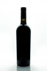 Black wine bottle on a white background