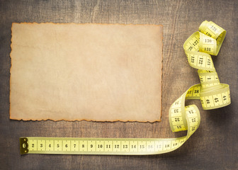 tape measure on slate stone background