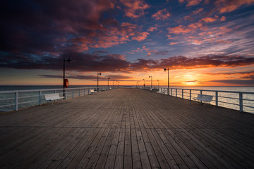 Sunset over wooden pier