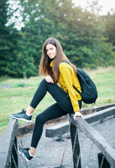 Brunette woman hiking in mountains.