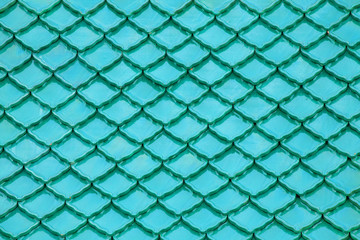 Blue tile background.