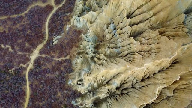 4K. Aerial view of clay cliffs near Omarama, natural rock formations in South Canterbury, South Island, New Zealand.