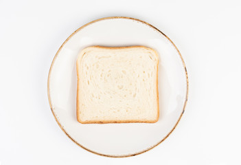 toast on a white plate on a gray background, top view