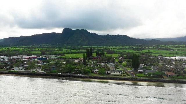 Cruising Along Northern Kauai Coastline Aerial Drone Angle