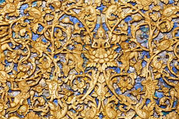Fototapeta na wymiar Gold color Pattern on the church wall.