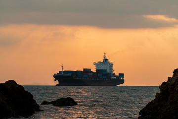 Obraz premium Container cargo ship in the sea. import export business logistic and transportation