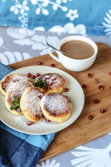 Breakfast in bed. Homemade curd fritters