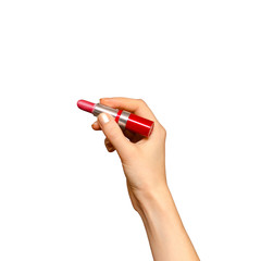 Female hand holding red lipstick, isolated on white