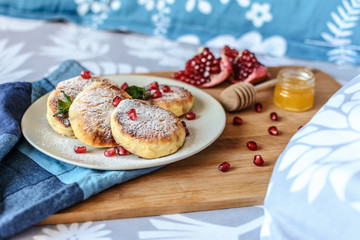 Breakfast in bed. Homemade curd fritters