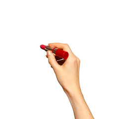 Female hand holding red lipstick, isolated on white