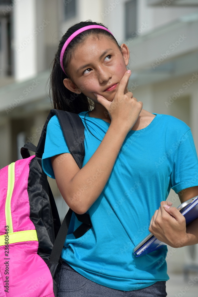 Wall mural Young Female Student Thinking