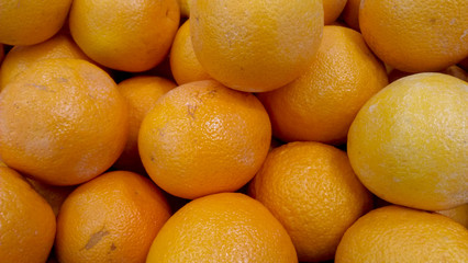 Obraz na płótnie Canvas Oranges in fresh market for background