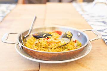 Delicious Spanish paella with mussels and seafoods