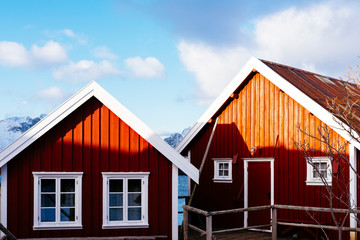 Two red fisherman's houses in Reine, the most famous village on the Lofoten islands