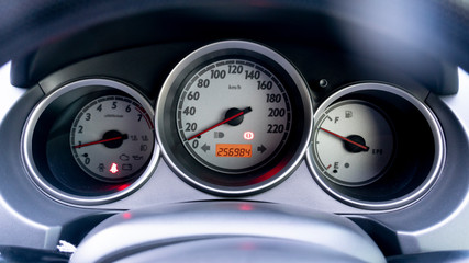 Mile of car first start checking engine at day.